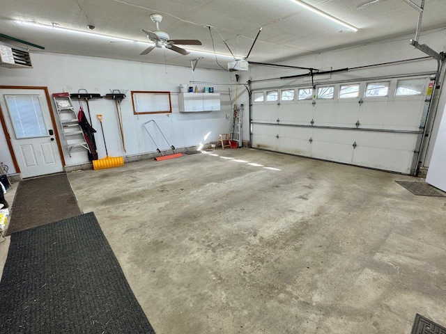1001 1st Ave NW, Pelican Rapids, MN 56572 - garage with a garage door opener and ceiling fan