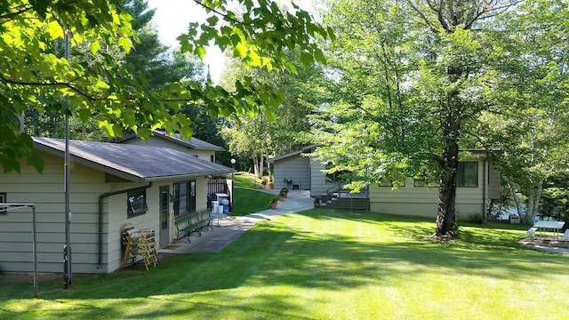 view of yard with a patio area