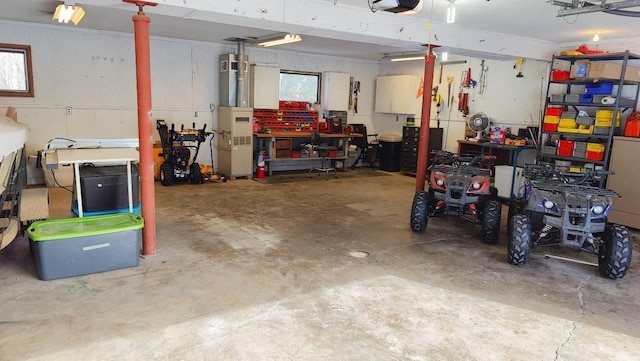 garage featuring a workshop area and a garage door opener