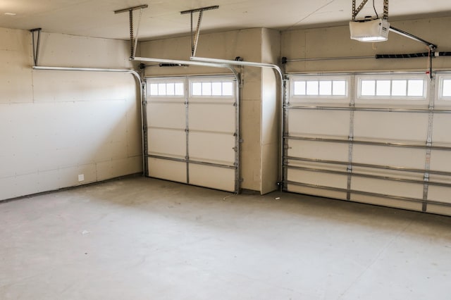 garage featuring a garage door opener