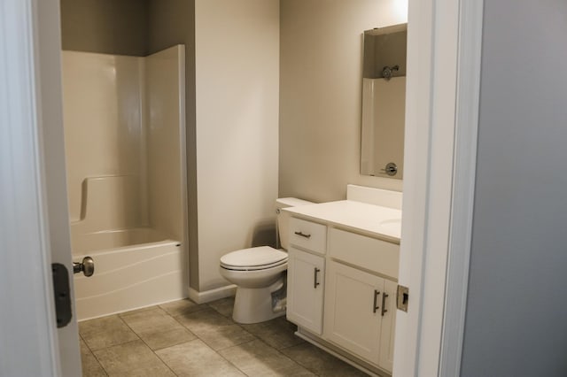 bathroom featuring tile patterned flooring,  shower combination, toilet, and vanity