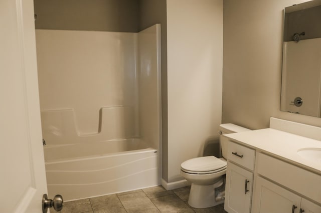 full bath with tile patterned floors, toilet, vanity, and shower / bathing tub combination