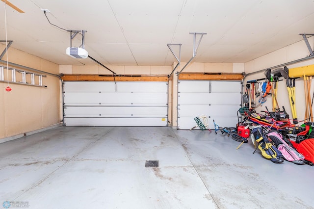 garage featuring a garage door opener