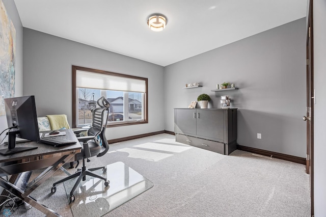 office space featuring carpet flooring and baseboards