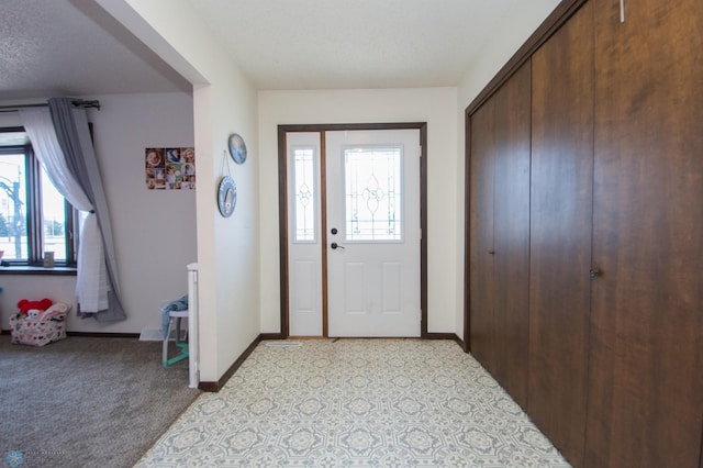 foyer with baseboards