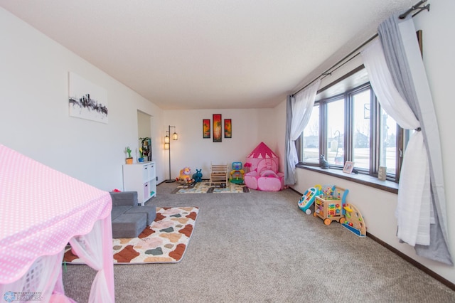 recreation room featuring carpet flooring