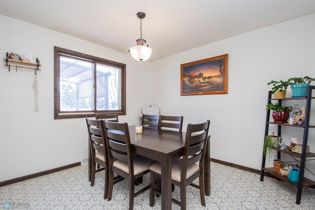 dining room with baseboards