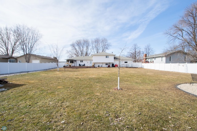 view of yard featuring a fenced backyard