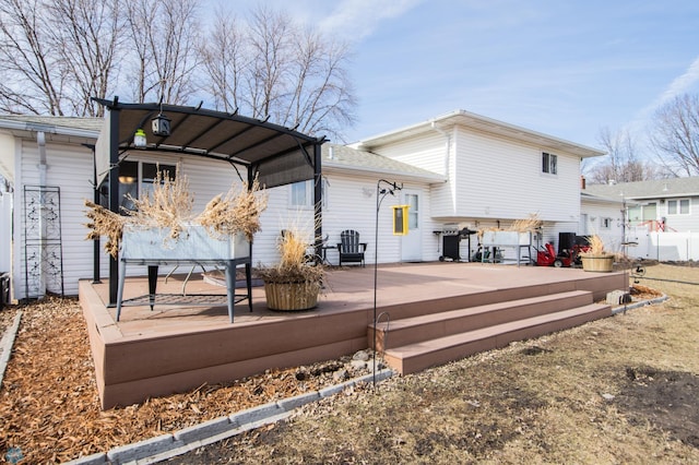 rear view of property with driveway and a patio area