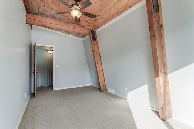 unfurnished bedroom with visible vents, carpet floors, baseboards, wood ceiling, and vaulted ceiling