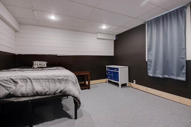 bedroom featuring recessed lighting, baseboards, and a paneled ceiling