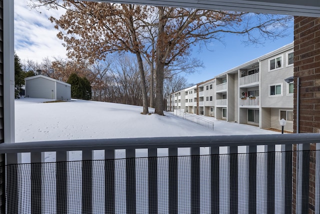 view of yard layered in snow