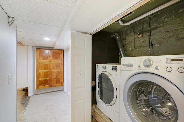 washroom with laundry area and washing machine and dryer