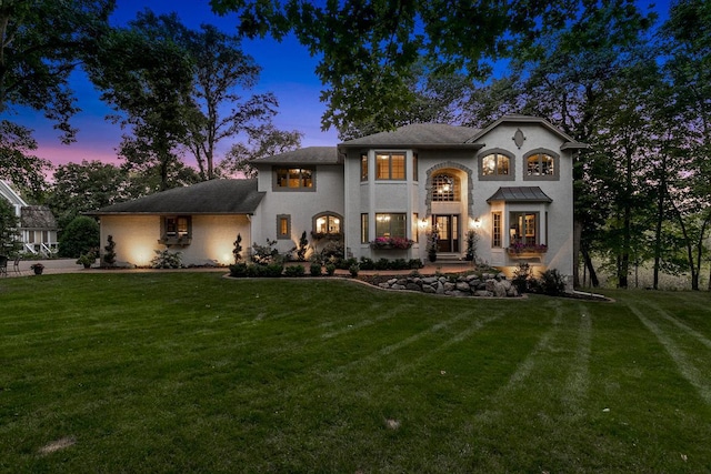 view of front of home featuring a yard