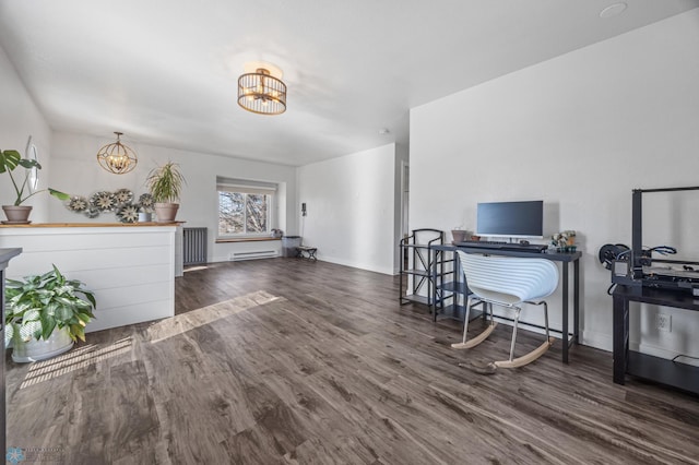 office featuring a baseboard radiator, baseboards, an inviting chandelier, and wood finished floors