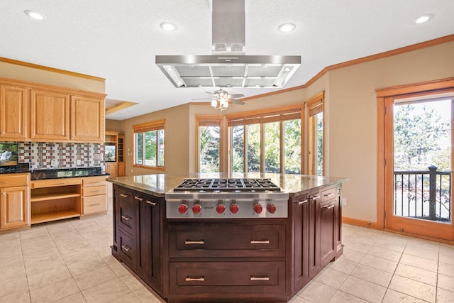 kitchen featuring open shelves, stainless steel gas stovetop, crown molding, tasteful backsplash, and island range hood