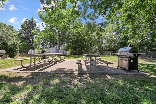 view of yard featuring a patio and a fenced backyard