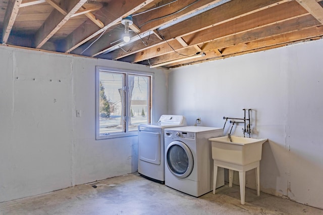 laundry room featuring laundry area and separate washer and dryer