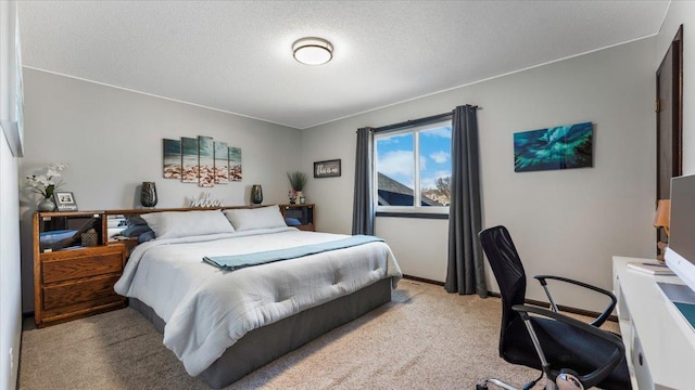 carpeted bedroom with a textured ceiling