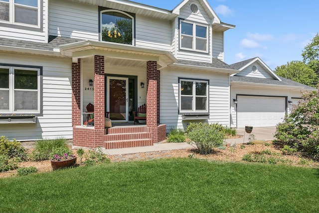 2415 Field Ct, Saint Cloud, MN 56301 - view of front of property featuring a shingled roof, a porch, an attached garage, and brick siding