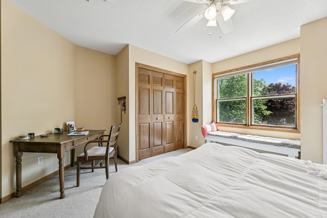 2415 Field Ct, Saint Cloud, MN 56301 - carpeted bedroom featuring baseboards, a closet, and ceiling fan