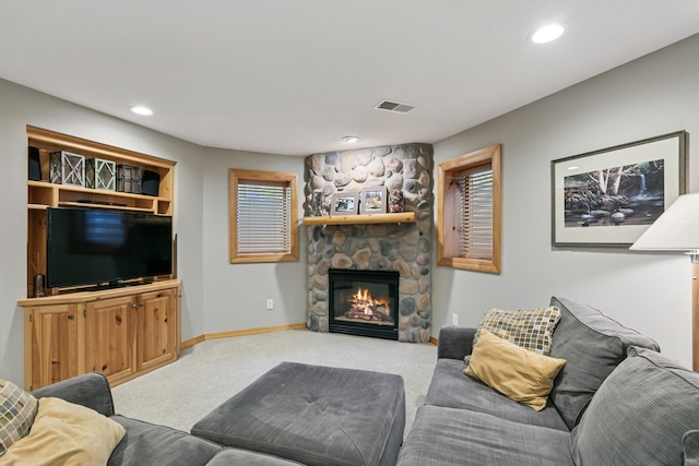 2415 Field Ct, Saint Cloud, MN 56301 - living room with carpet, a fireplace, baseboards, and recessed lighting