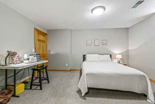 2415 Field Ct, Saint Cloud, MN 56301 - bedroom featuring light carpet, a textured ceiling, an office area, and baseboards