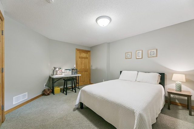 2415 Field Ct, Saint Cloud, MN 56301 - carpeted bedroom with baseboards and a textured ceiling