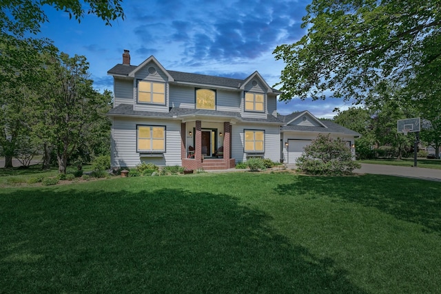 2415 Field Ct, Saint Cloud, MN 56301 - view of front of house with a chimney, a yard, a garage, concrete driveway, and a shingled roof