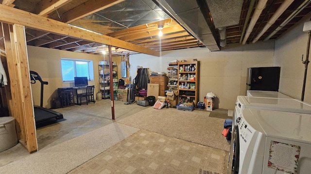 basement featuring separate washer and dryer