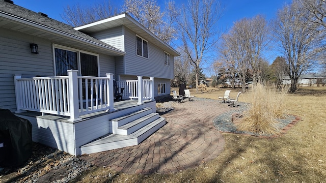 exterior space featuring a grill and a patio