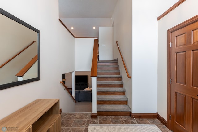 staircase featuring recessed lighting and baseboards