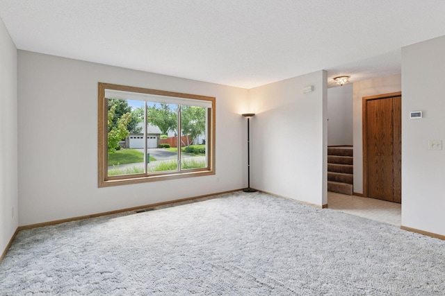 18884 Pennington Ave, Eden Prairie, MN 55346 - empty room with carpet floors and stairway