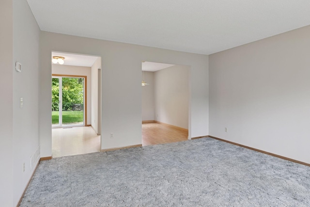 18884 Pennington Ave, Eden Prairie, MN 55346 - unfurnished room featuring carpet flooring and baseboards