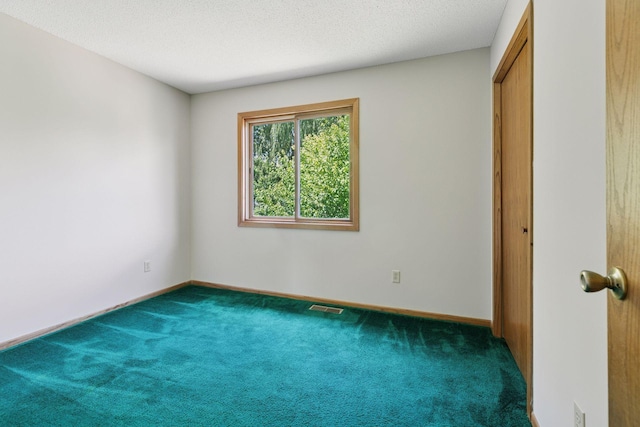18884 Pennington Ave, Eden Prairie, MN 55346 - unfurnished bedroom featuring carpet and a closet