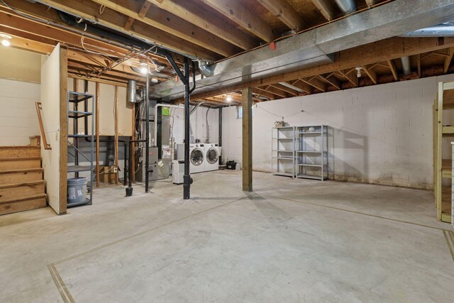 18884 Pennington Ave, Eden Prairie, MN 55346 - unfinished basement with washer and clothes dryer, stairs, and concrete block wall