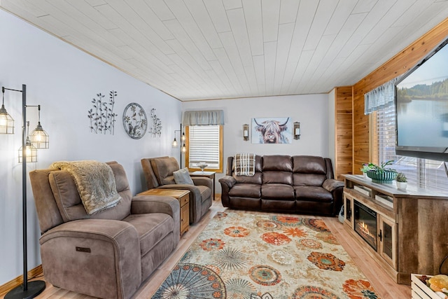 living room with wood ceiling and light wood-style floors