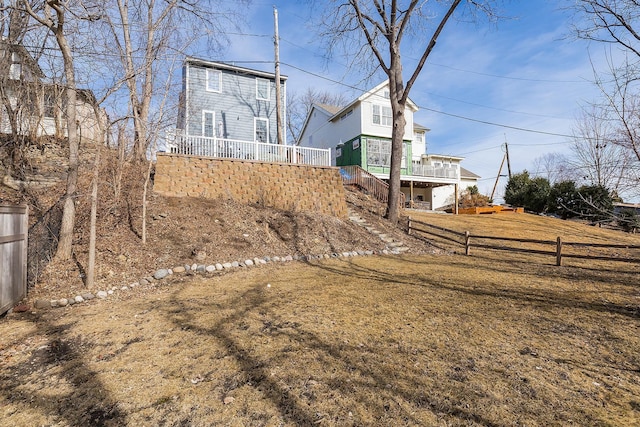 exterior space featuring stairs and fence