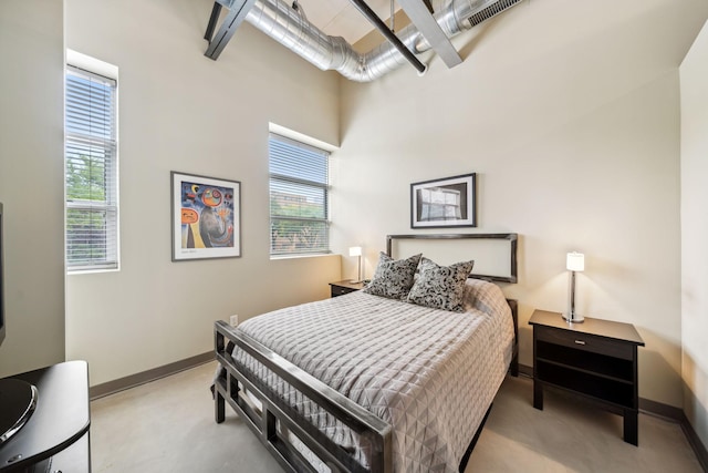 bedroom featuring baseboards