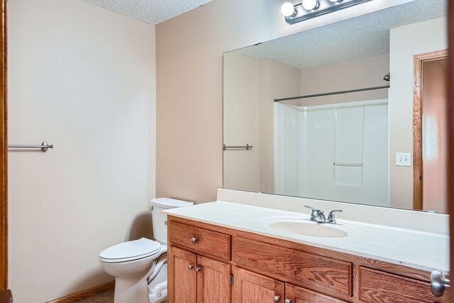 16786 Embers Ave, Lakeville, MN 55024 - full bath with a textured ceiling, toilet, vanity, and a shower