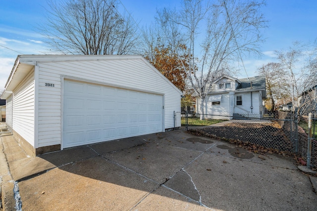 garage with fence