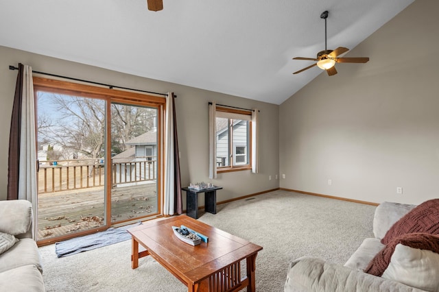28510 142nd St NW, Zimmerman, MN 55398 - living room with ceiling fan, lofted ceiling, baseboards, and light colored carpet