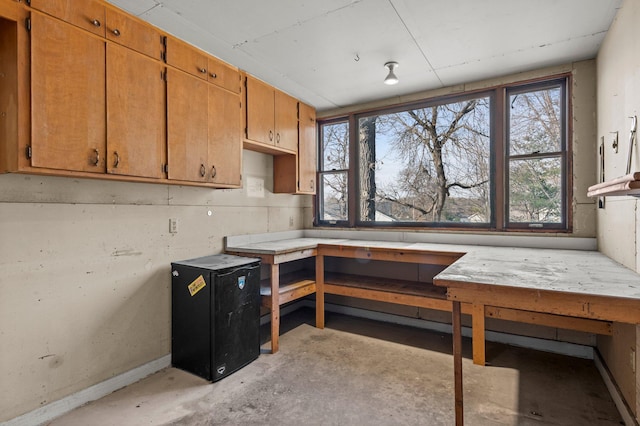 28510 142nd St NW, Zimmerman, MN 55398 - dining space featuring concrete floors and baseboards