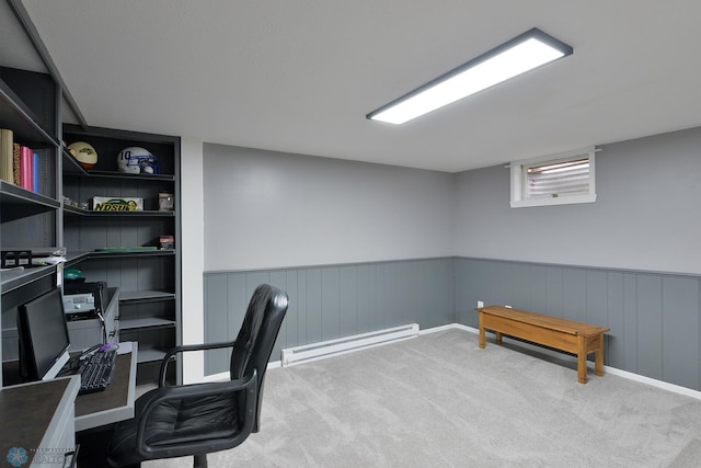 office space with baseboard heating, wainscoting, and carpet flooring