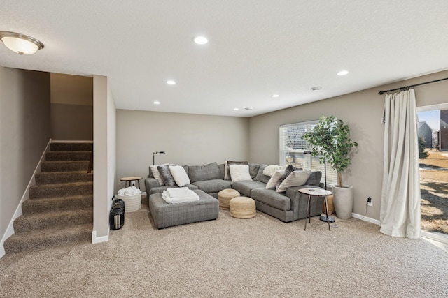 living area featuring stairway, recessed lighting, baseboards, and carpet