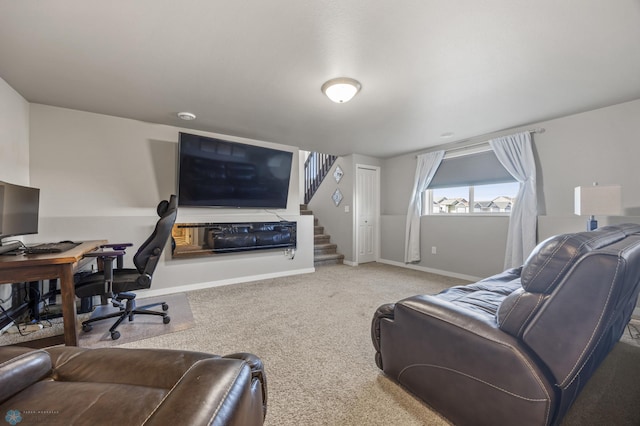 living room with stairs, baseboards, and carpet floors