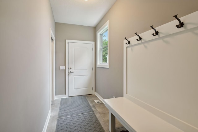 mudroom with visible vents and baseboards