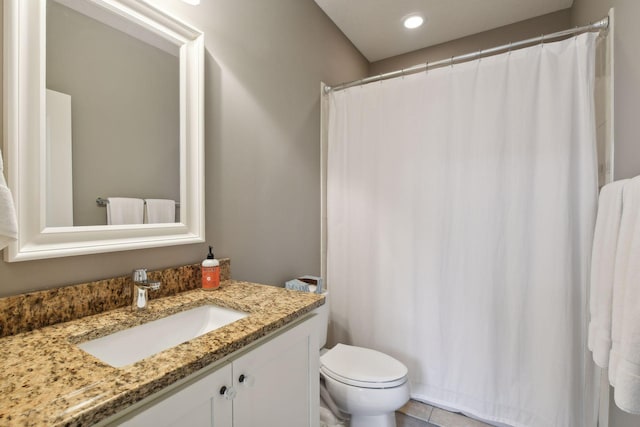 5613 Abbott Ave S, Edina, MN 55410 - bathroom featuring vanity, toilet, and curtained shower
