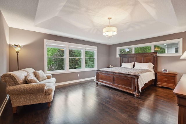 5613 Abbott Ave S, Edina, MN 55410 - bedroom with dark wood-style floors, baseboards, and a textured ceiling