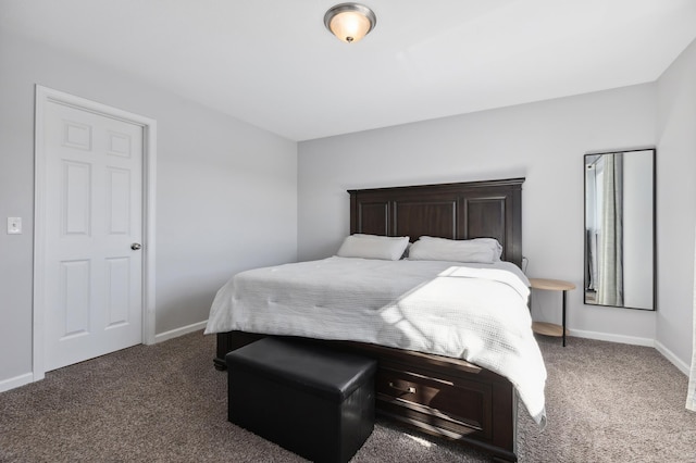 carpeted bedroom with baseboards